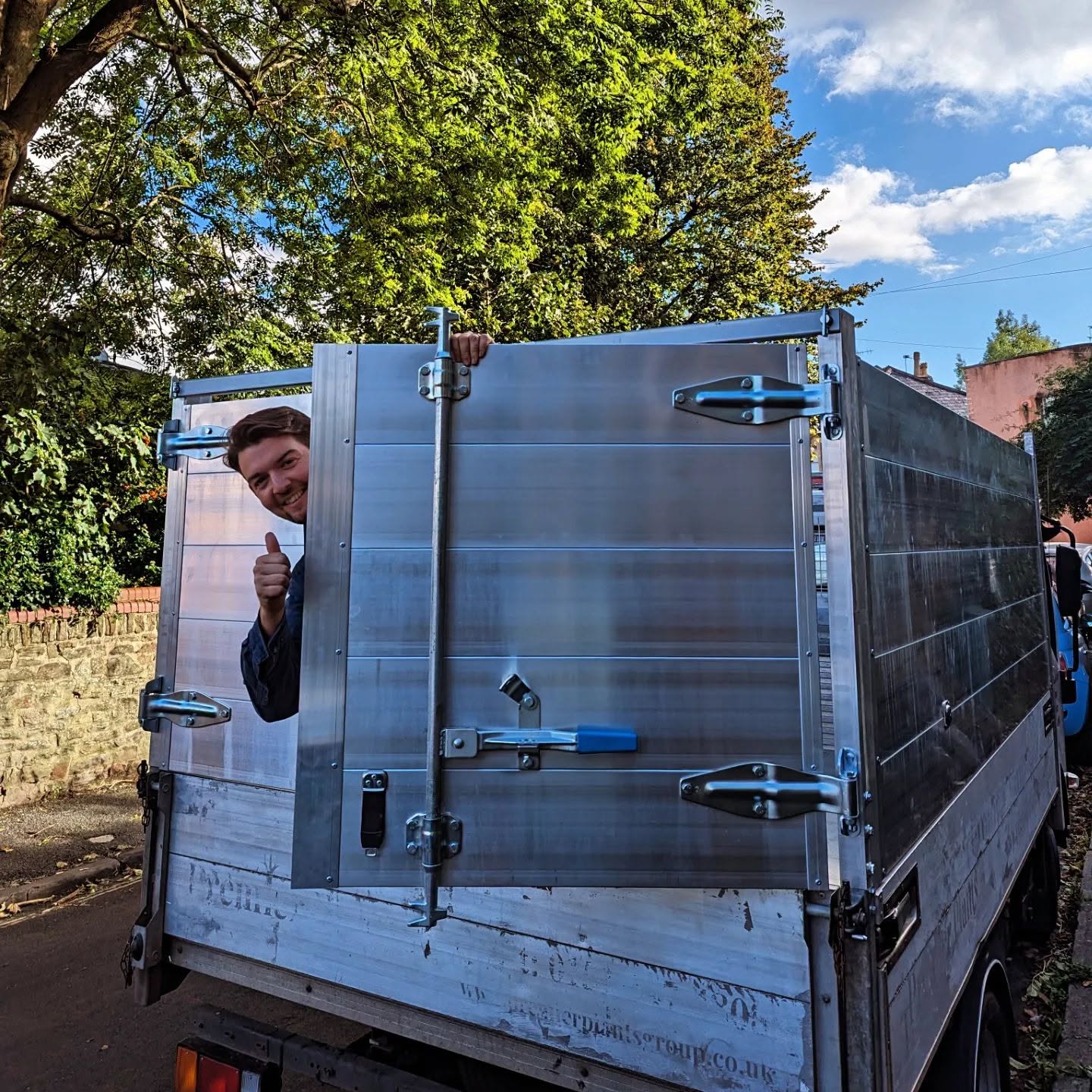 Samuel Duke Tree Services worker with a tree-service vehicle in Bristol.